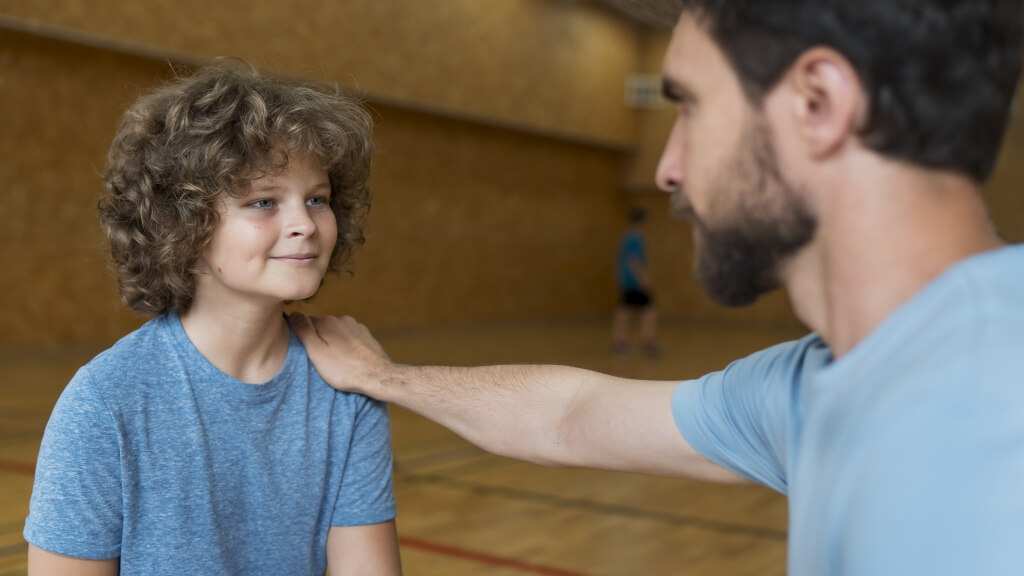 close-up-kid-sports-teacher.jpg close-up-kid-sports-teacher.jpg
